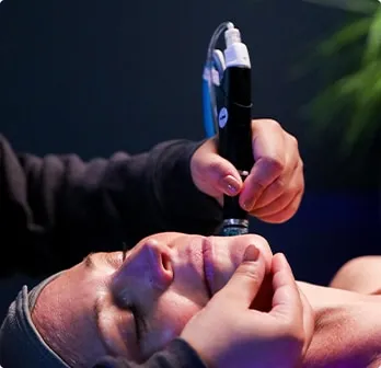 Patient receiving Hydrafacial™ treatment.