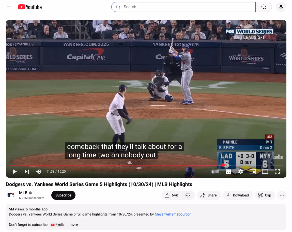 A YouTube video of a World Series baseball game between the Yankees and Dodgers shows a batter mid-pitch. Closed captions appear at the bottom of the screen, displaying a commentator’s speech: “comeback that they'll talk about for a long time two on nobody out.”