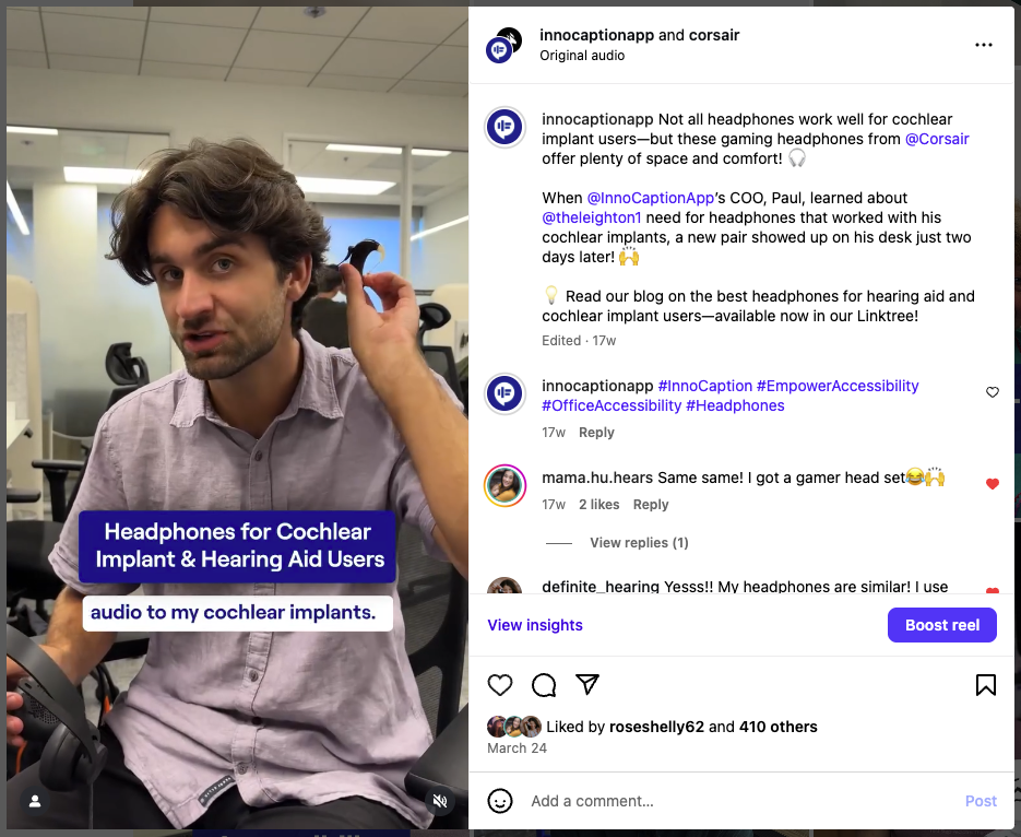 A young man with wavy brown hair sits in an office, holding a pair of Corsair gaming headphones near his ear while explaining how he connects audio to his cochlear implants. On-screen text reads “Headphones for Cochlear Implant & Hearing Aid Users.” The Instagram caption describes how InnoCaption’s COO quickly provided compatible headphones to support Leighton’s accessibility needs.
