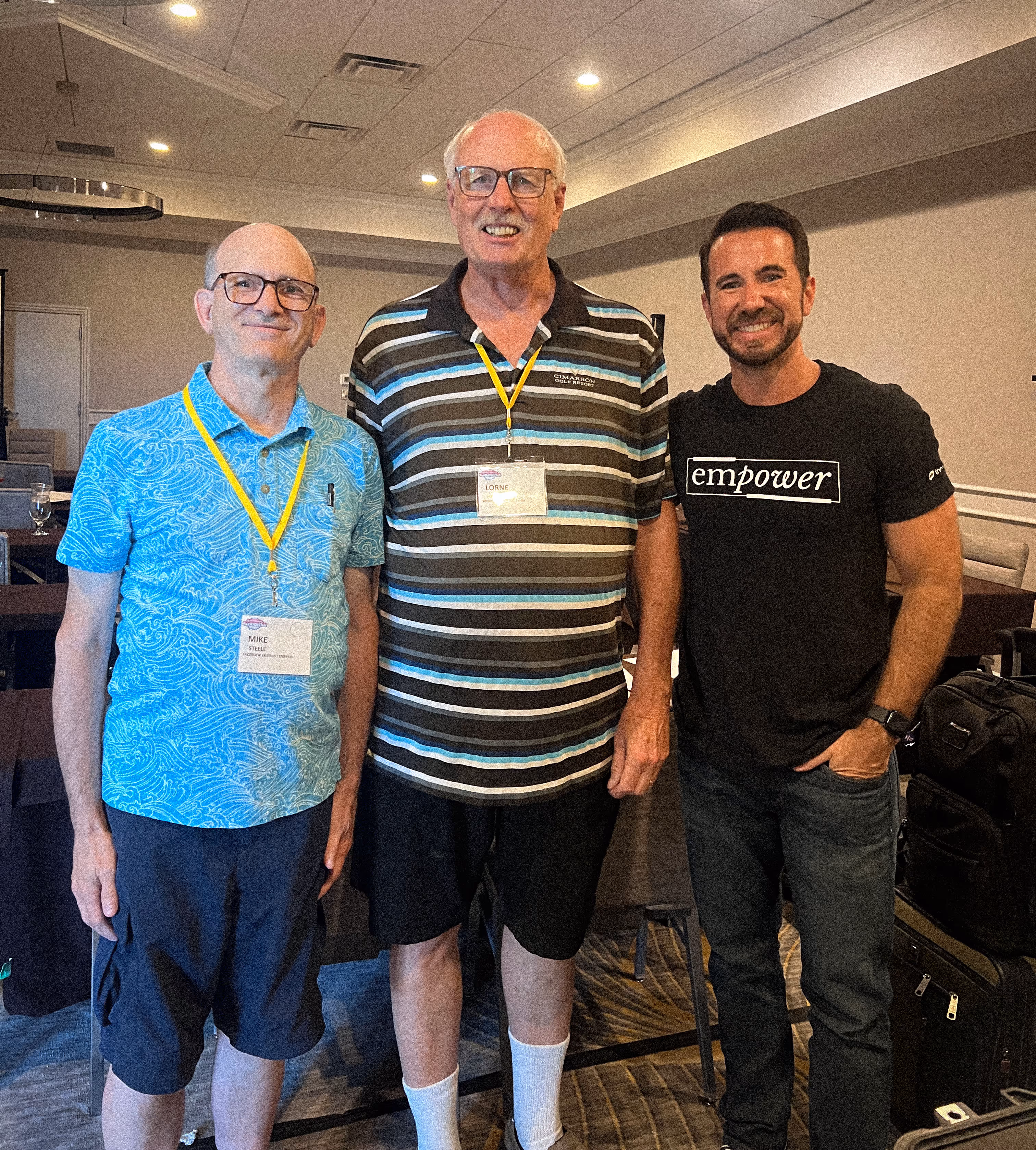 Matt, InnoCaption’s Sr. Director of Marketing, stands with two SayWhatClub members after his presentation on making phone calls more accessible, smiling together at the convention.