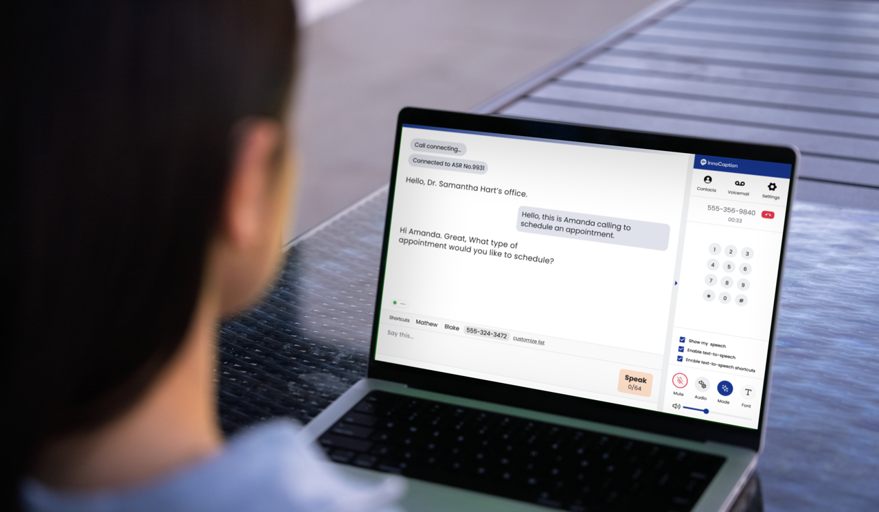A woman uses InnoCaption Web on a laptop to make a captioned call to a doctor's office. The call transcript appears on the left side of the screen and a dial pad on the right.