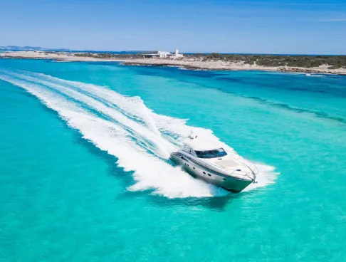 Boat on turquoise water.
