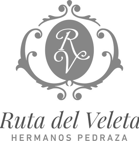 Elegant logo with intertwined letters R and V inside an ornate oval frame above the text 'Ruta del Veleta Hermanos Pedraza'.