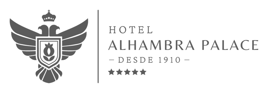Logo of Hotel Alhambra Palace featuring a crowned eagle emblem and text stating 'Hotel Alhambra Palace - Desde 1910' with five stars below.