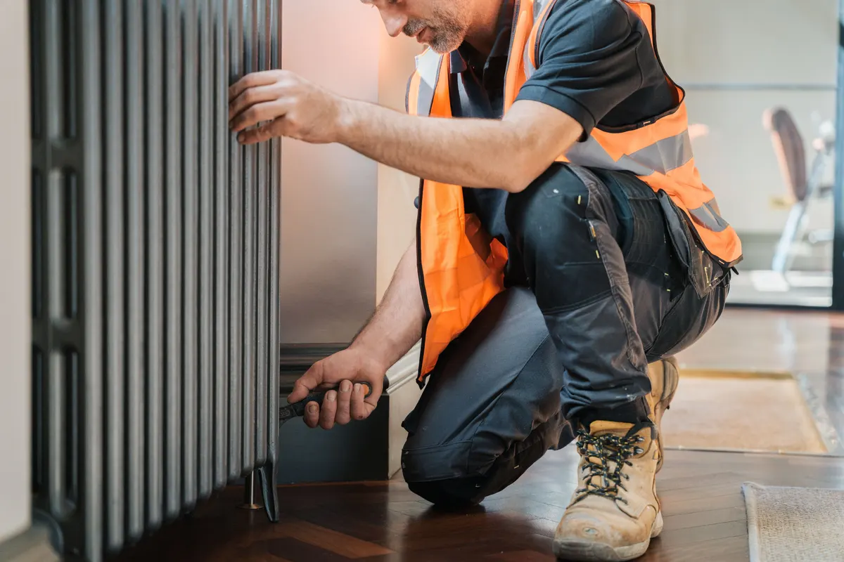 FS Group engineer working on a radiator