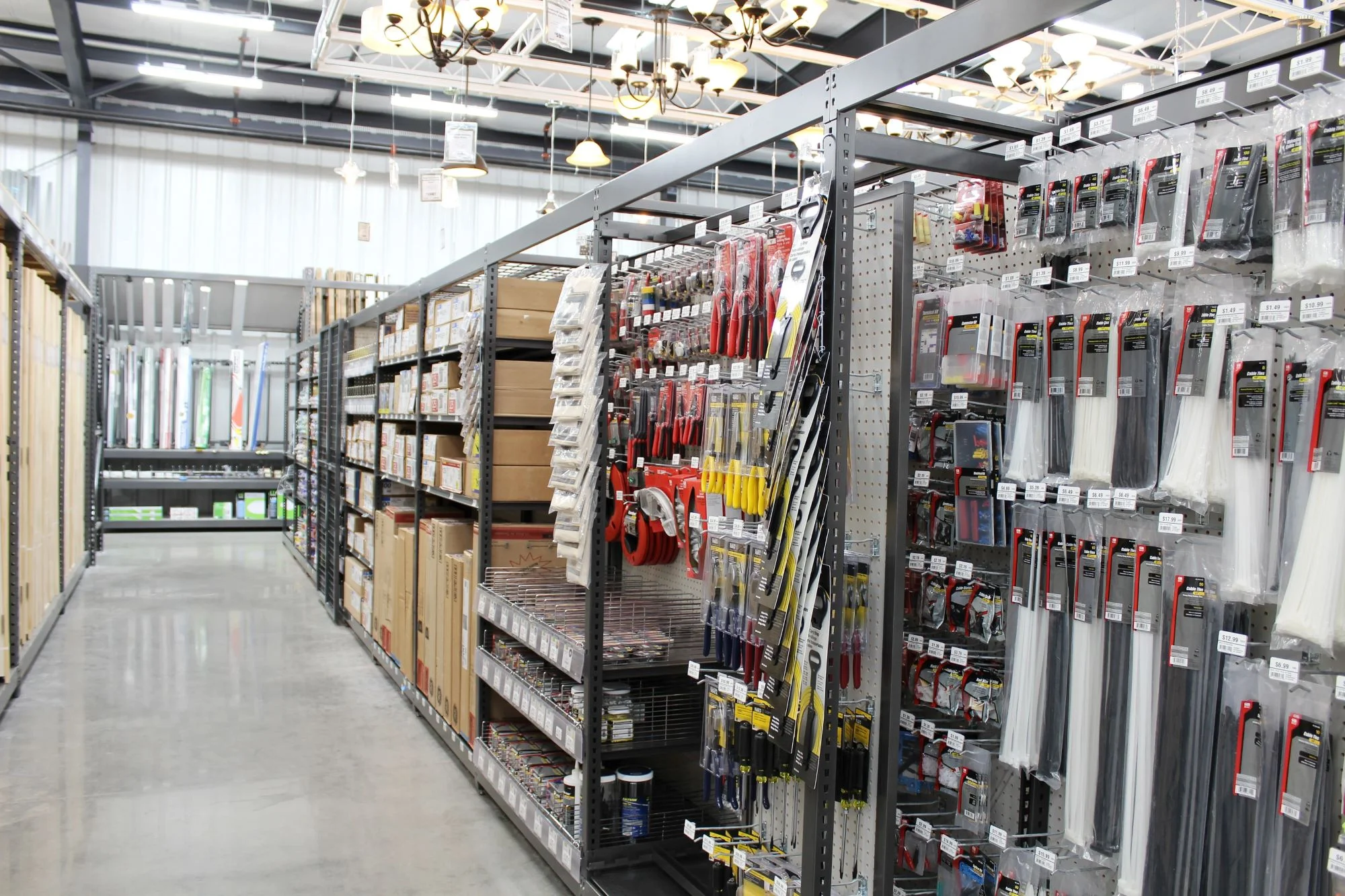 M-Line heavy duty retail shelving by Continental Store Fixture Group building supply store with rolling panels