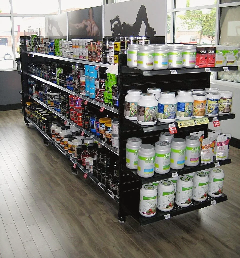 C-Line light duty gondola retail shelving in a supplement store by Continental Store Fixture Group