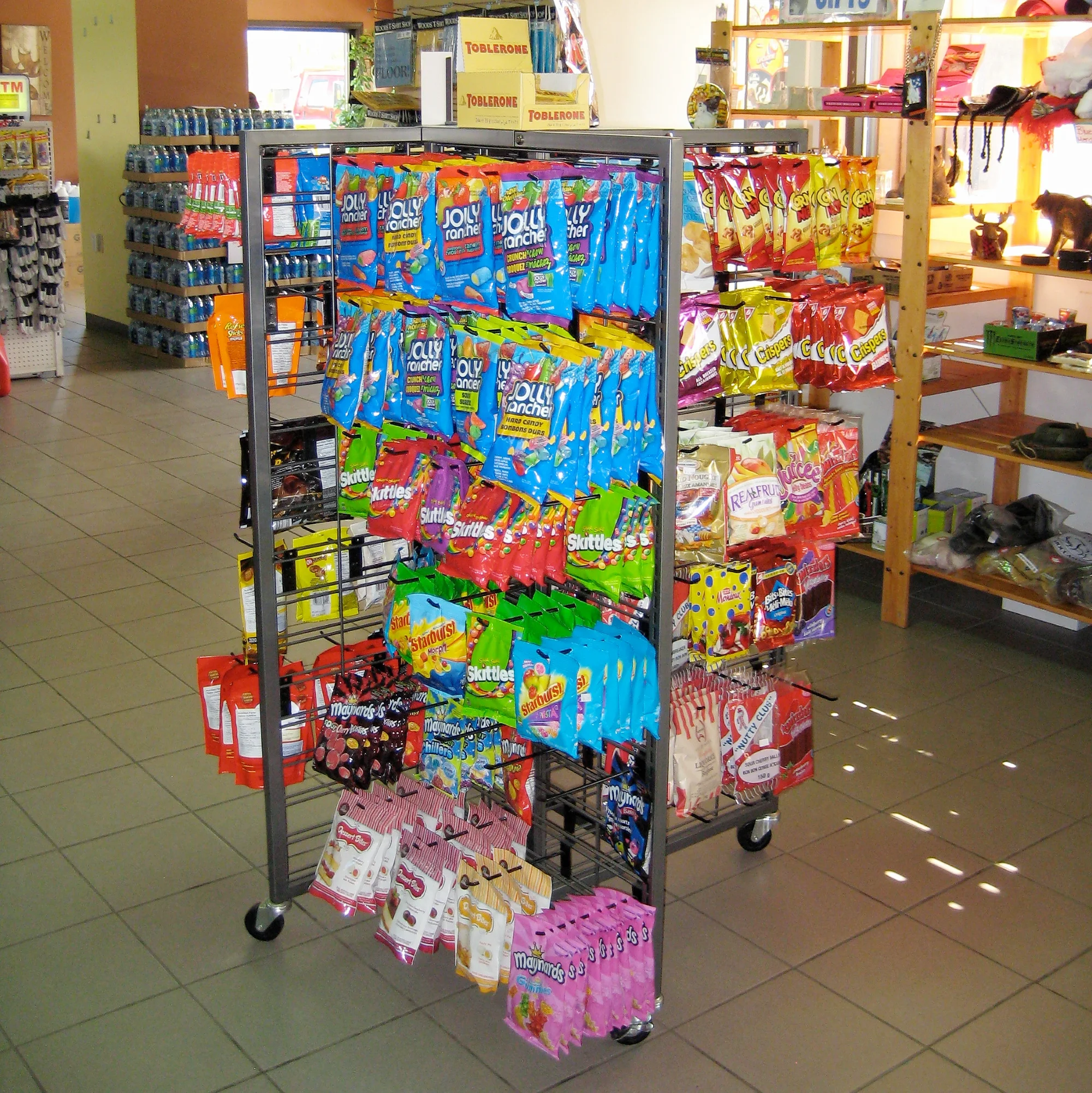 C-Line light duty gondola retail shelving in a convenience store by Continental Store Fixture Group