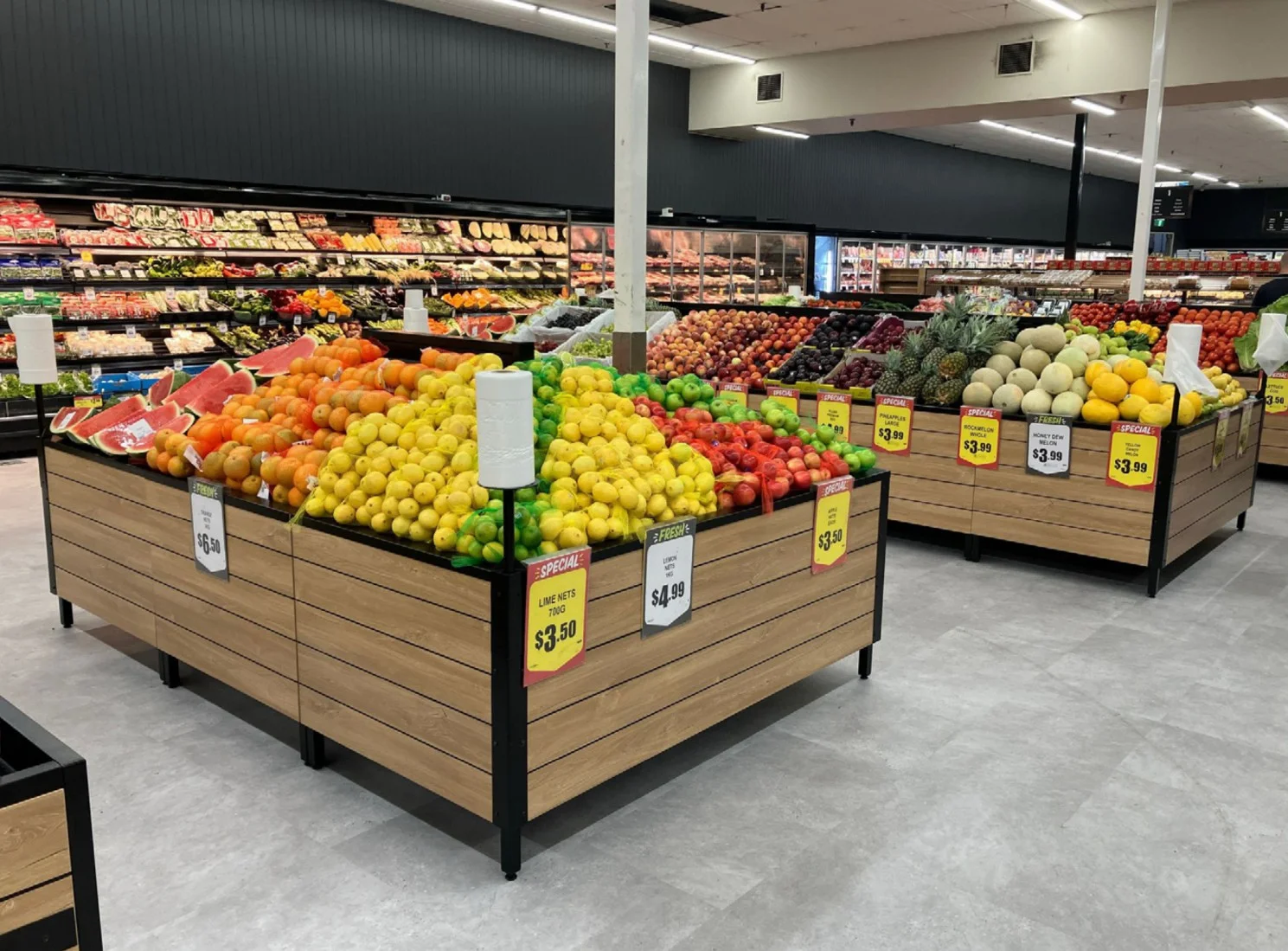 Specialty retail produce bins built to enhance store organization and merchandising — Continental Store Fixture Group, Canada