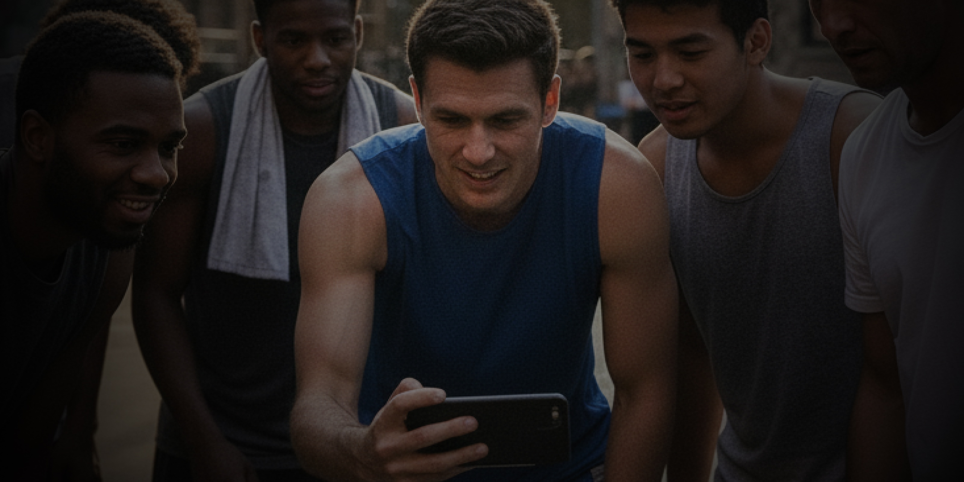 Basketball players looking at phone