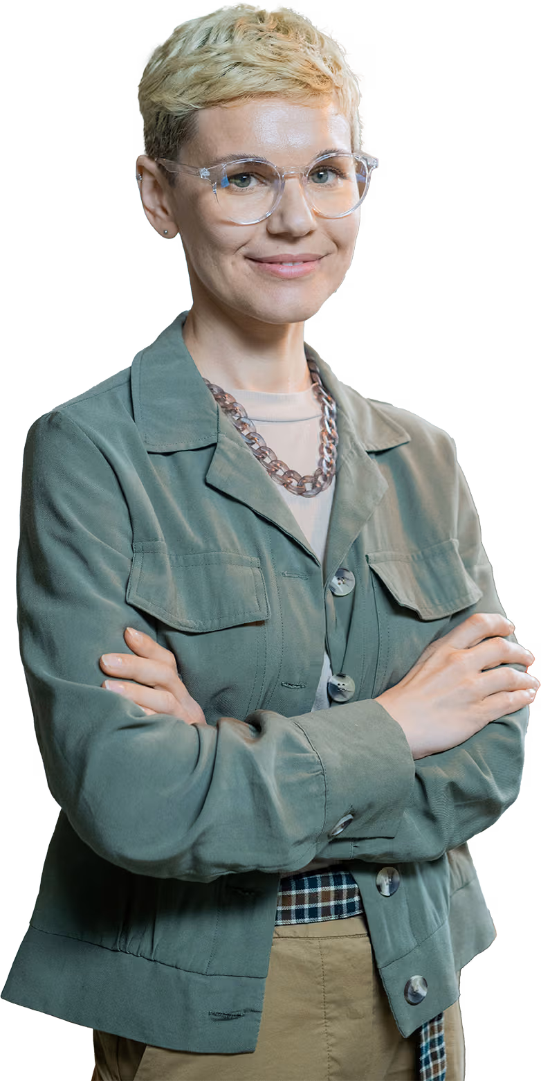 Young white female professional crossing arms smiling