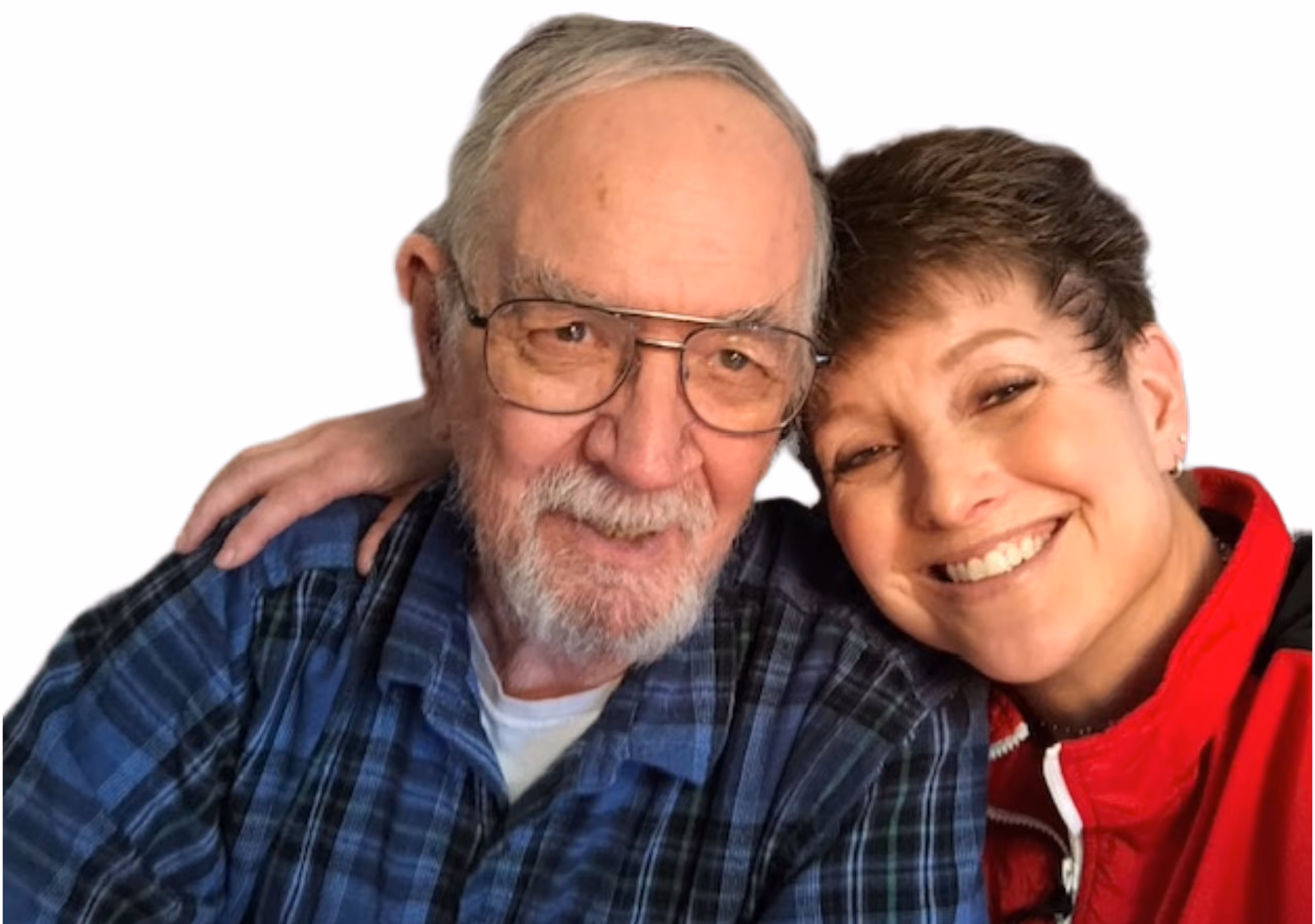 A man and a woman are smiling for the camera