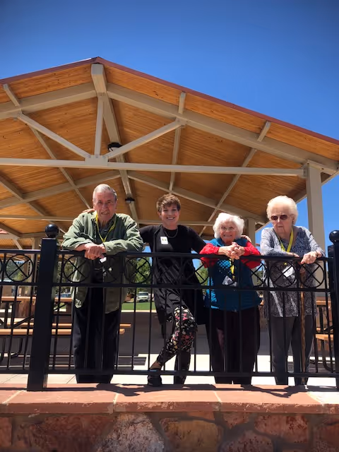 A group of people standing next to each other