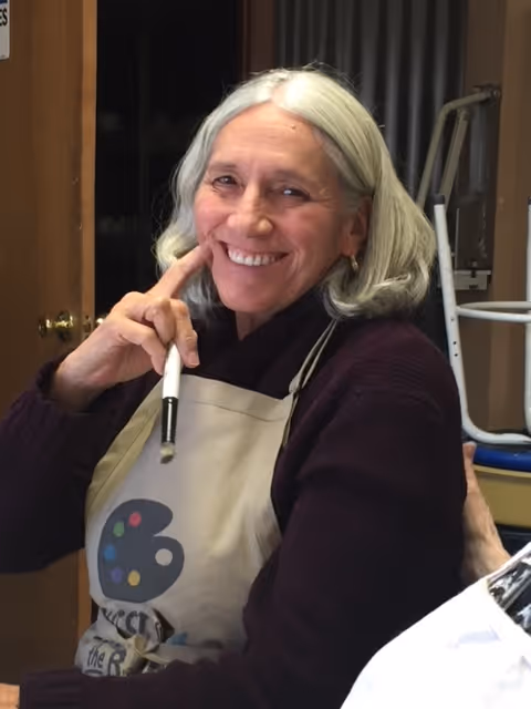 A woman enjoying being artistic.