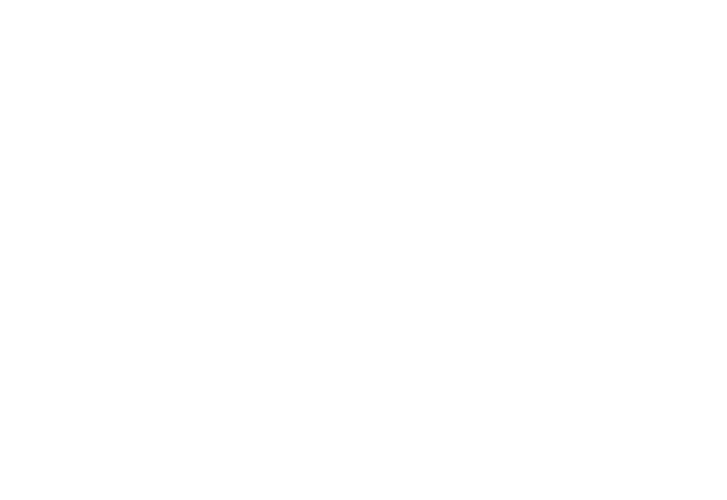 Close-up of a white curved shape with stepped edges on a black background.