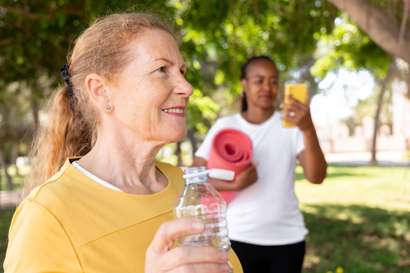 People exercising together outdoors.
