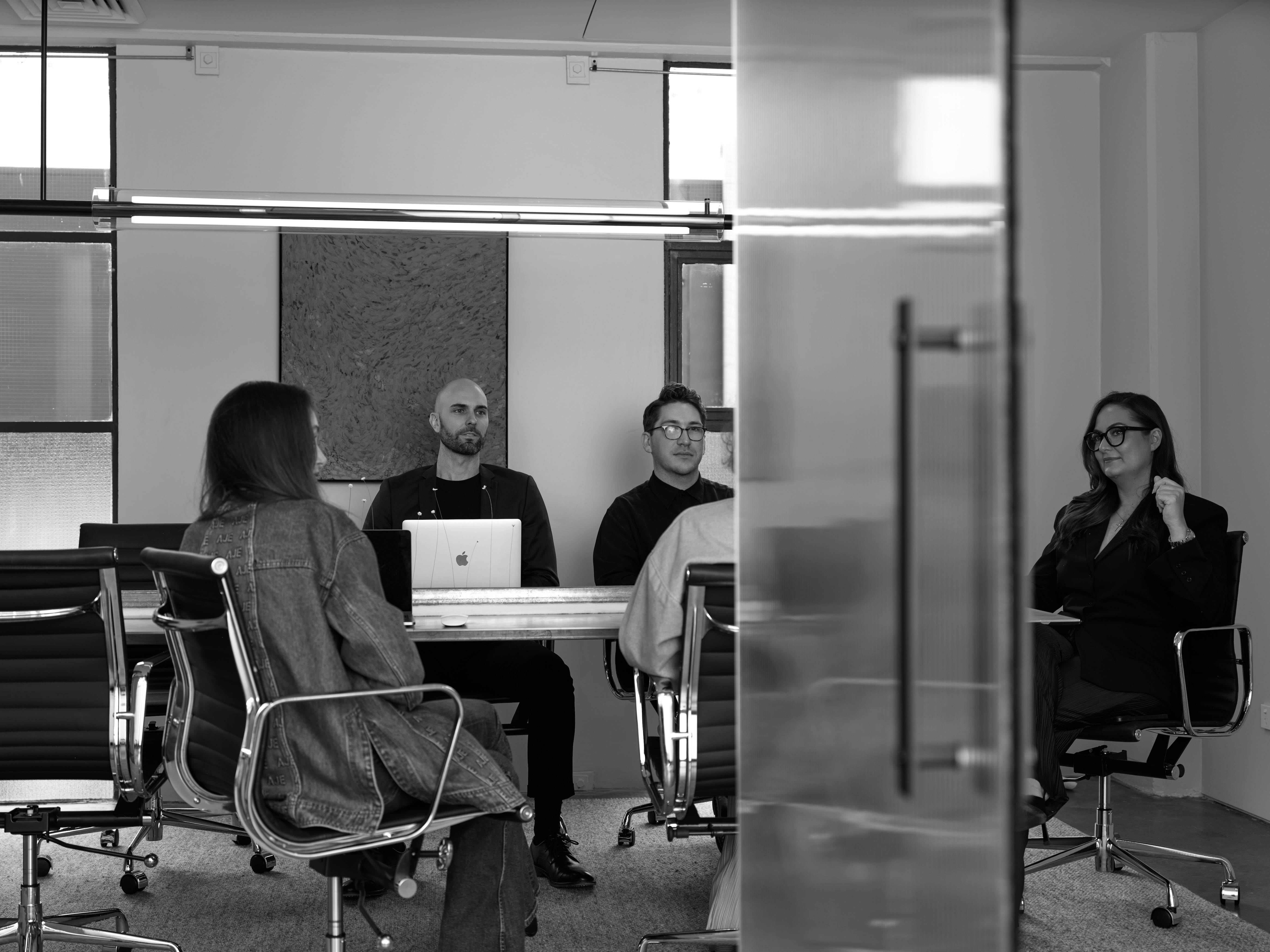 Power house collaborating in an open plan office