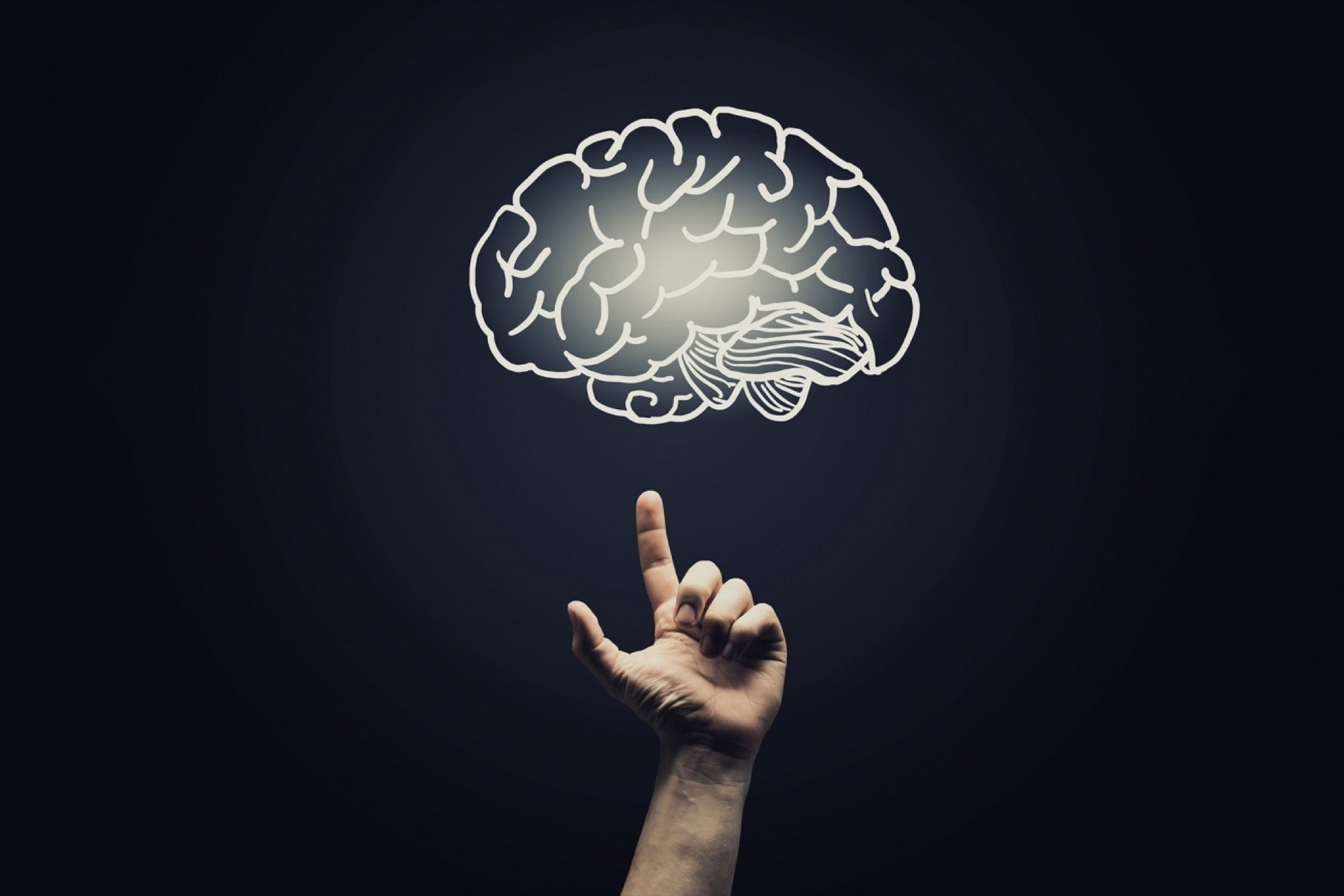 Finger pointing at brain