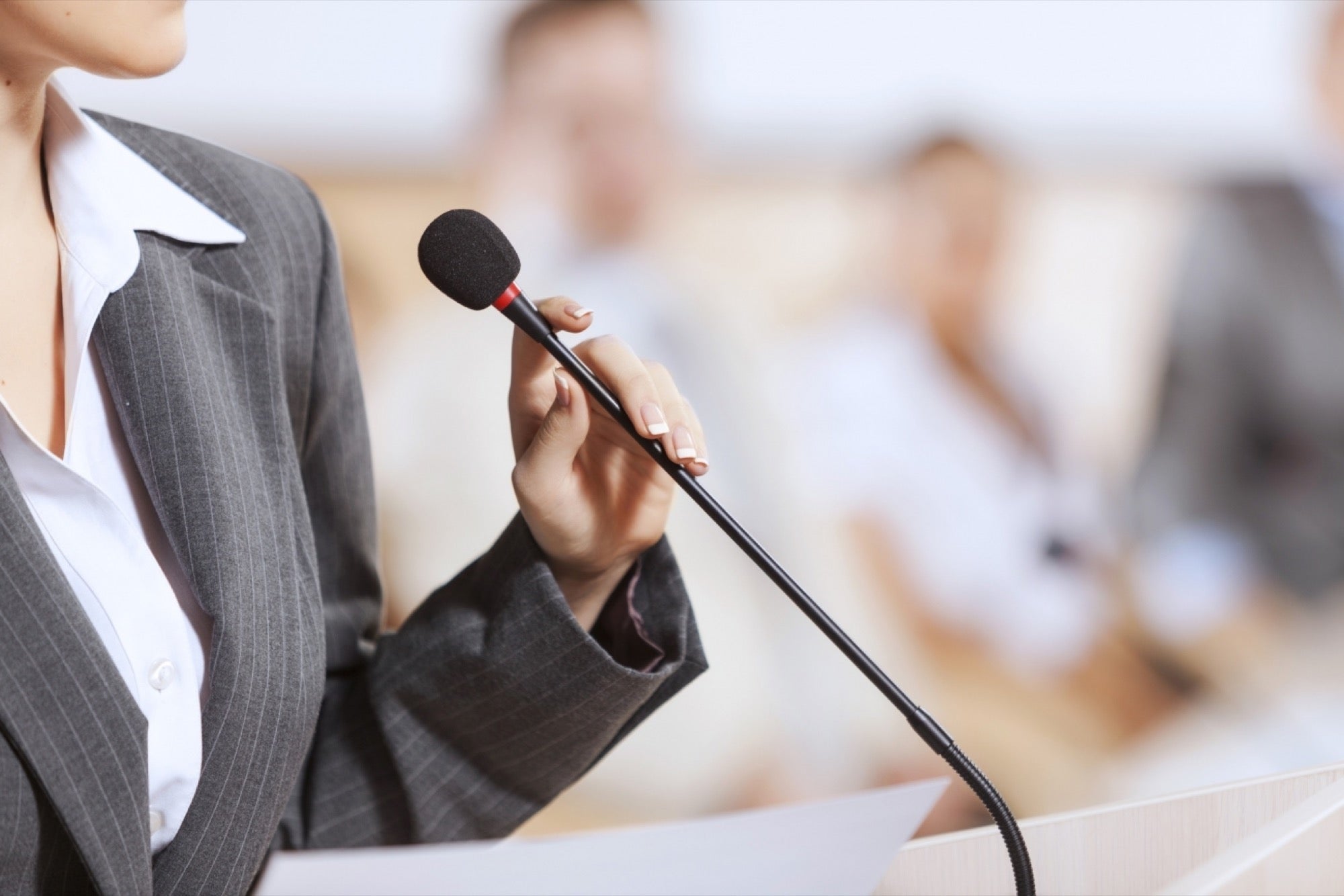 Woman on a microphone
