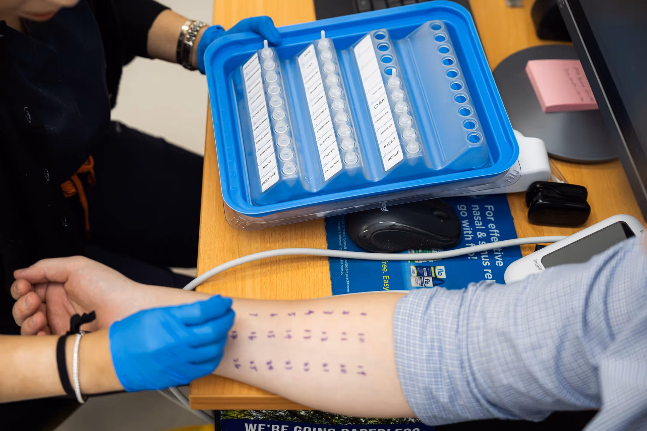 Assistant during an allergy testing procedure