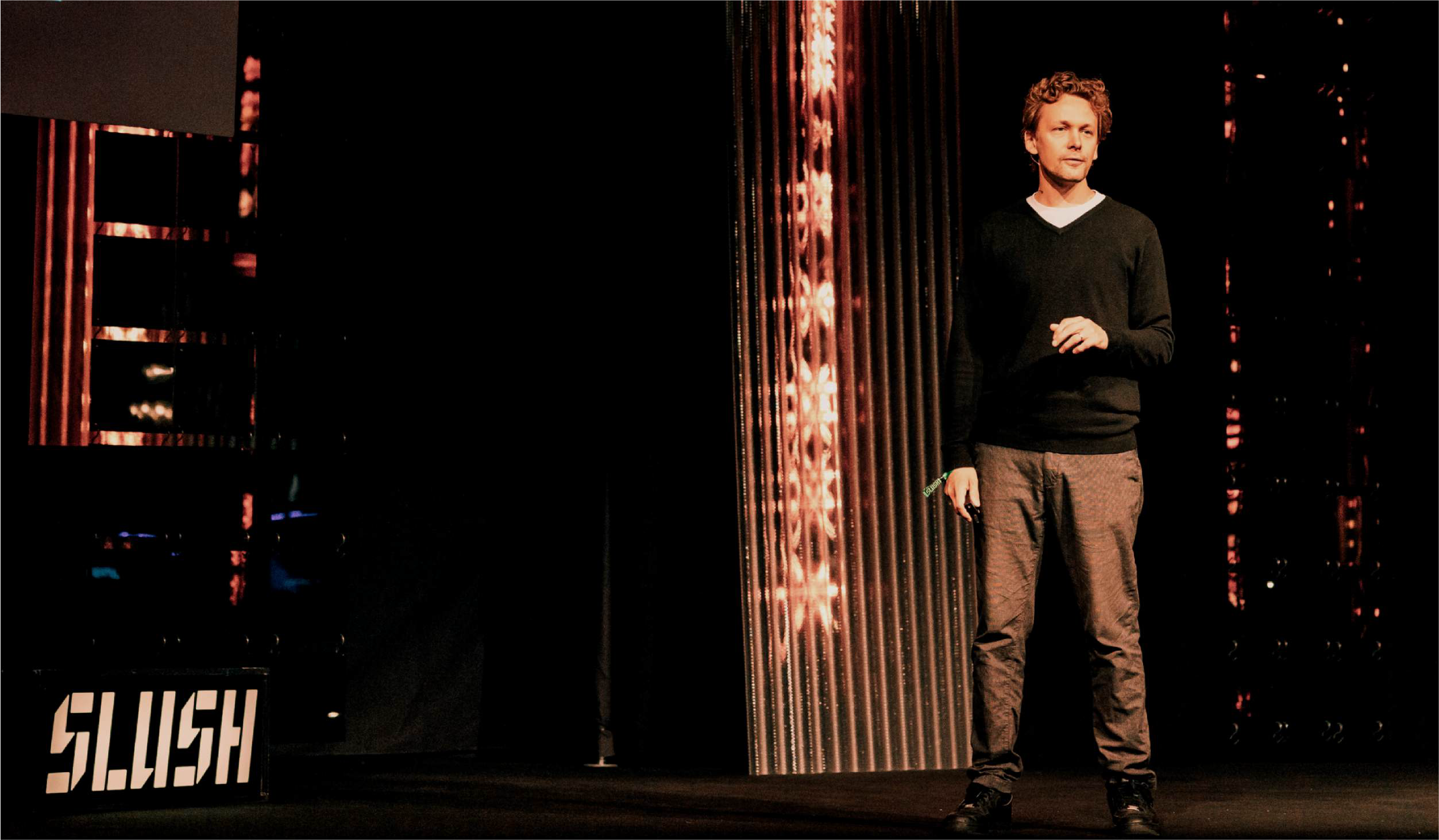Markus Pesonen speaking on stage