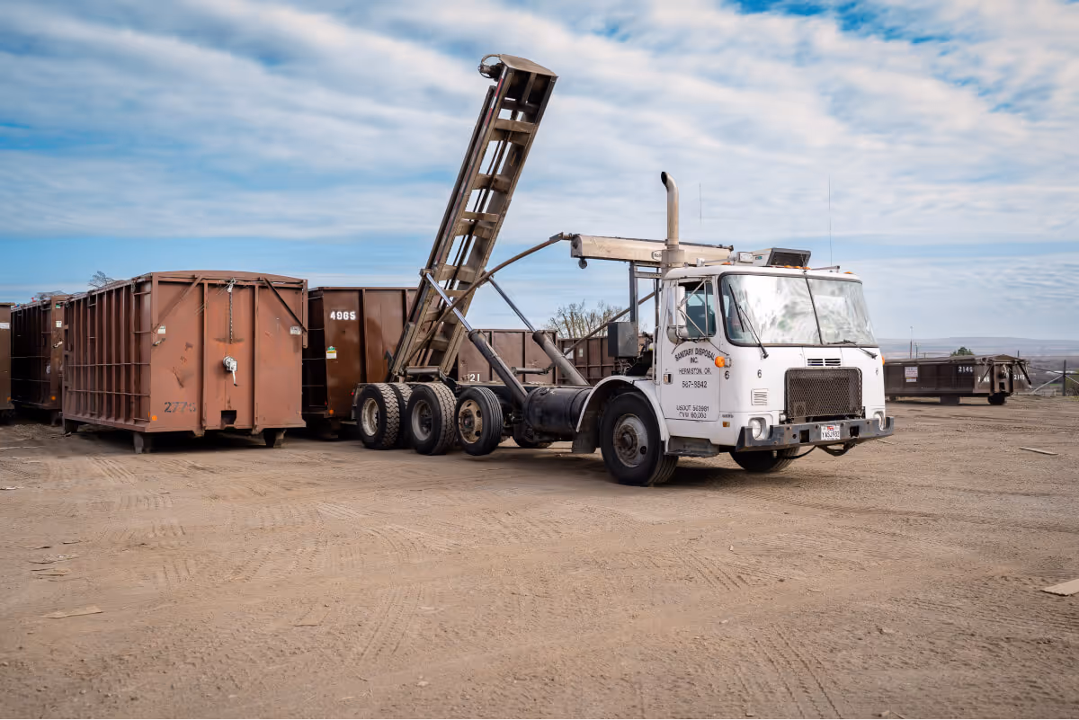 Sanitary Disposal commercial roll-off truck servicing Hermiston, Oregon area
