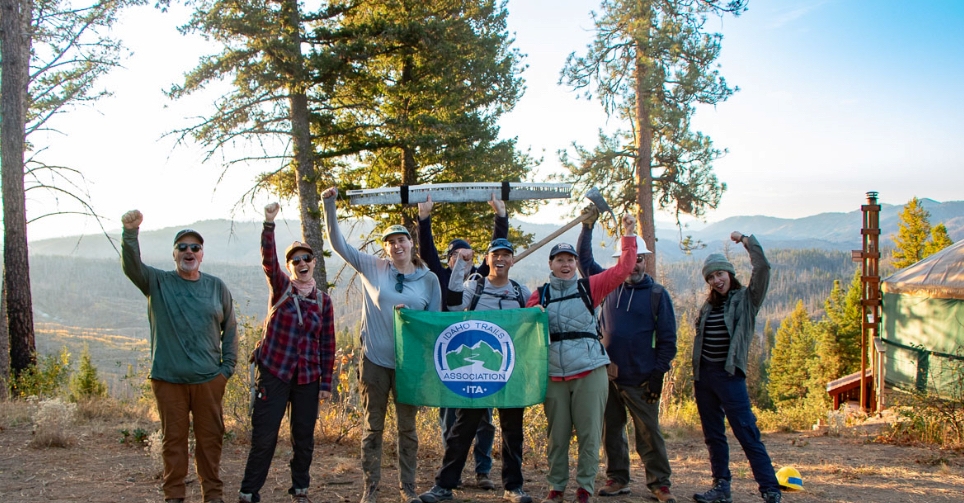 a group of people posing for a photo