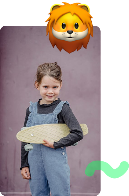 A young girl holding a skateboard
