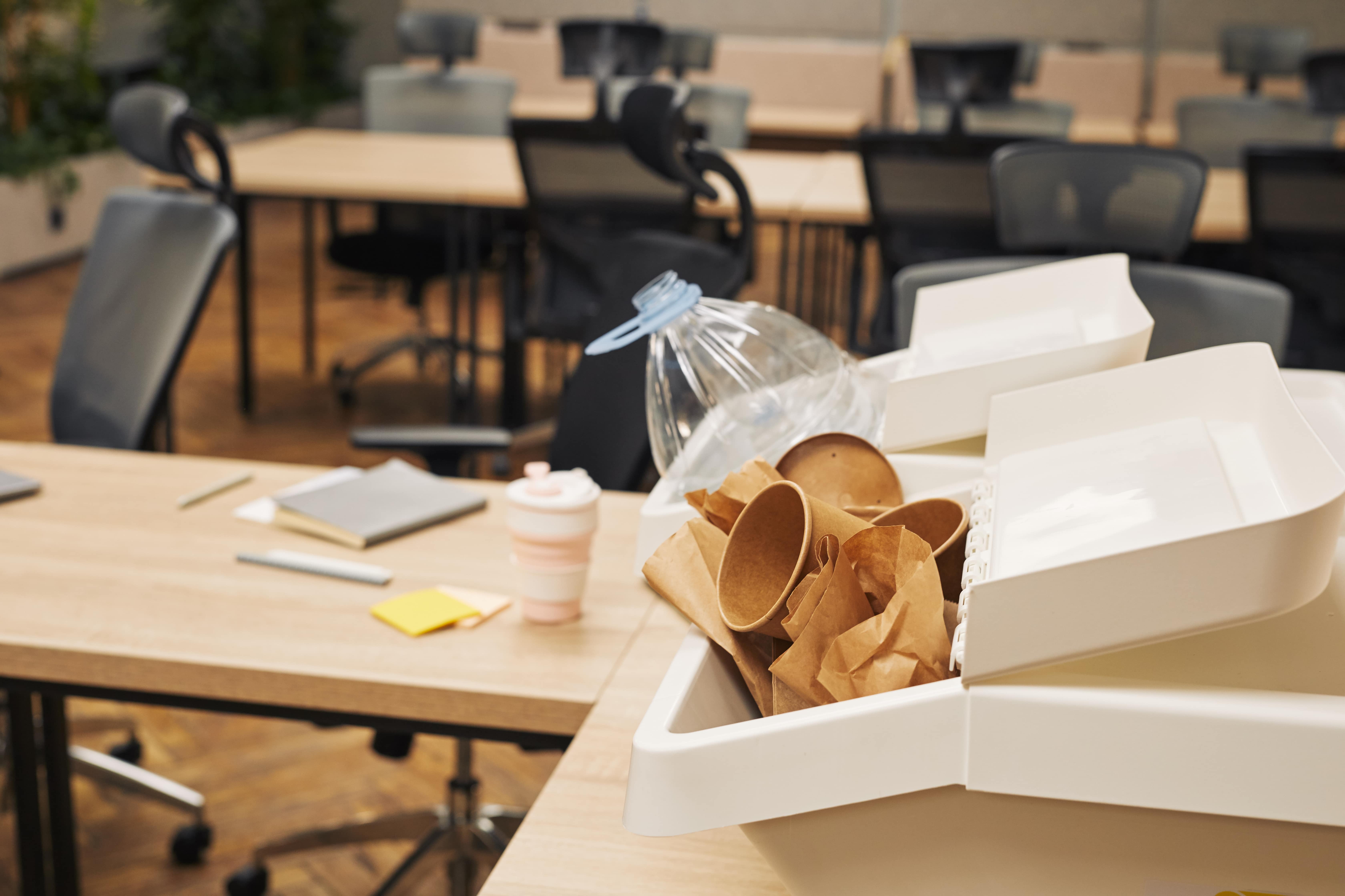 Meeting room with plastic bottles and packaging waste 