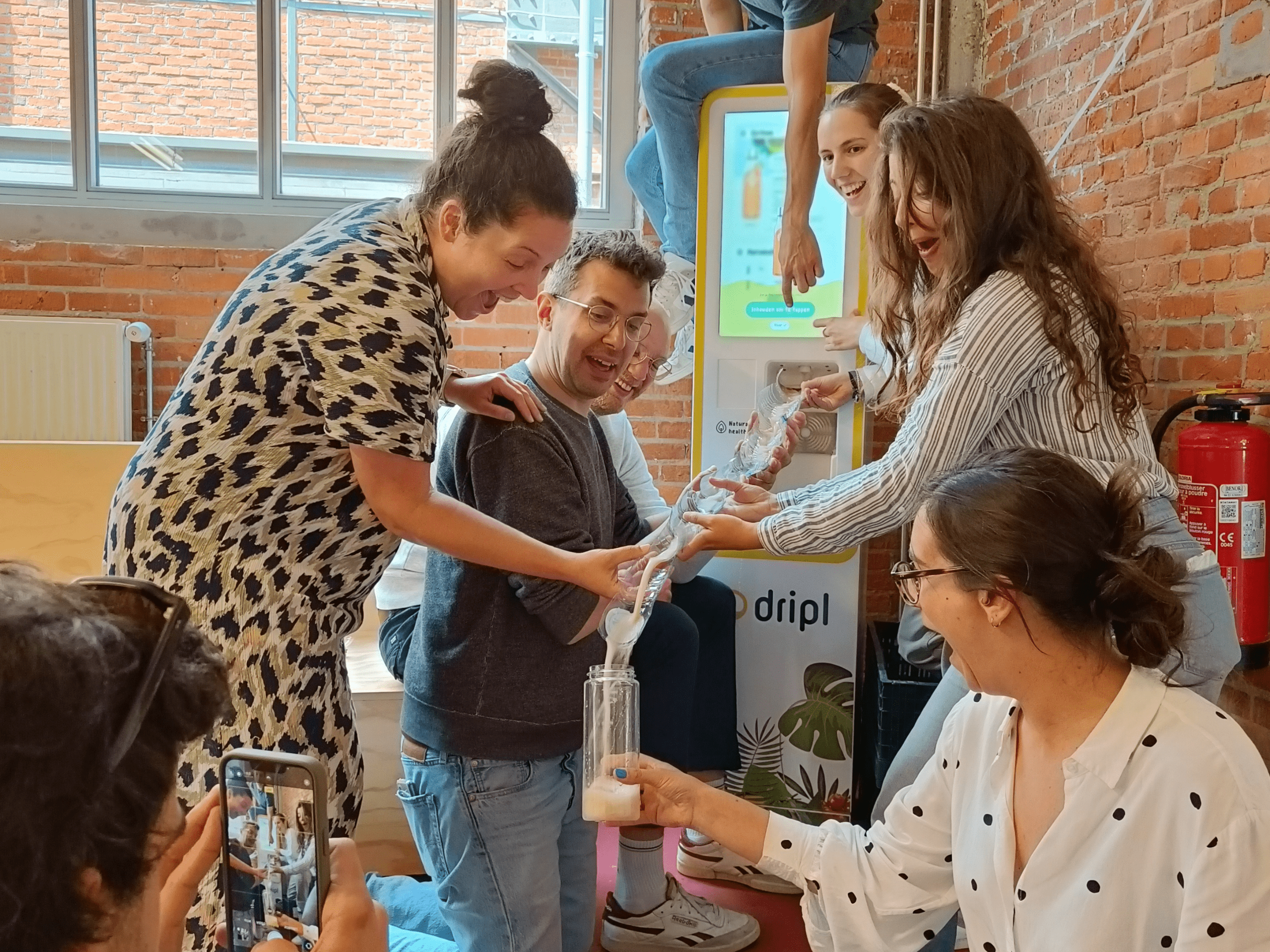 Sustainable beverage dispenser from Dripl at office to replace classic soft drink machine