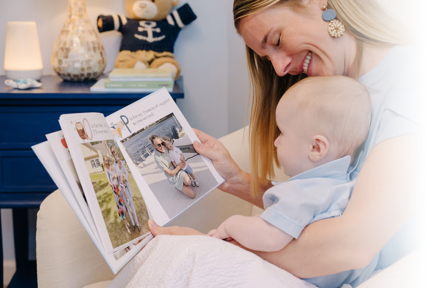 A mother reads her Stareworthy ABC Book to her baby son