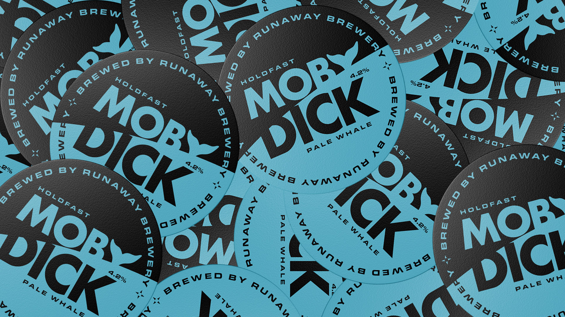 Layered circular coasters featuring the Moby Dick branding.