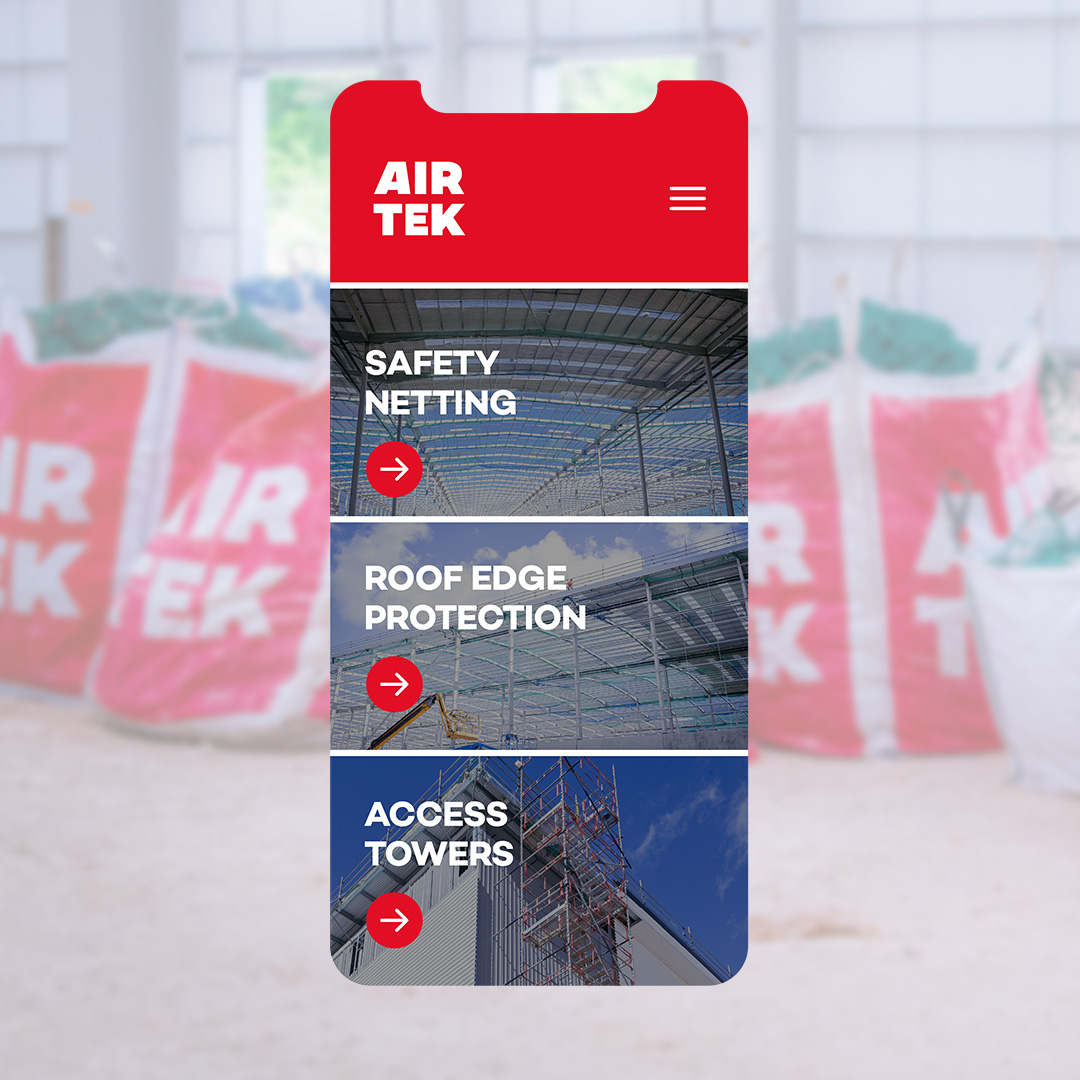 Mobile phone displaying the responsive layout of the Airtek website.
