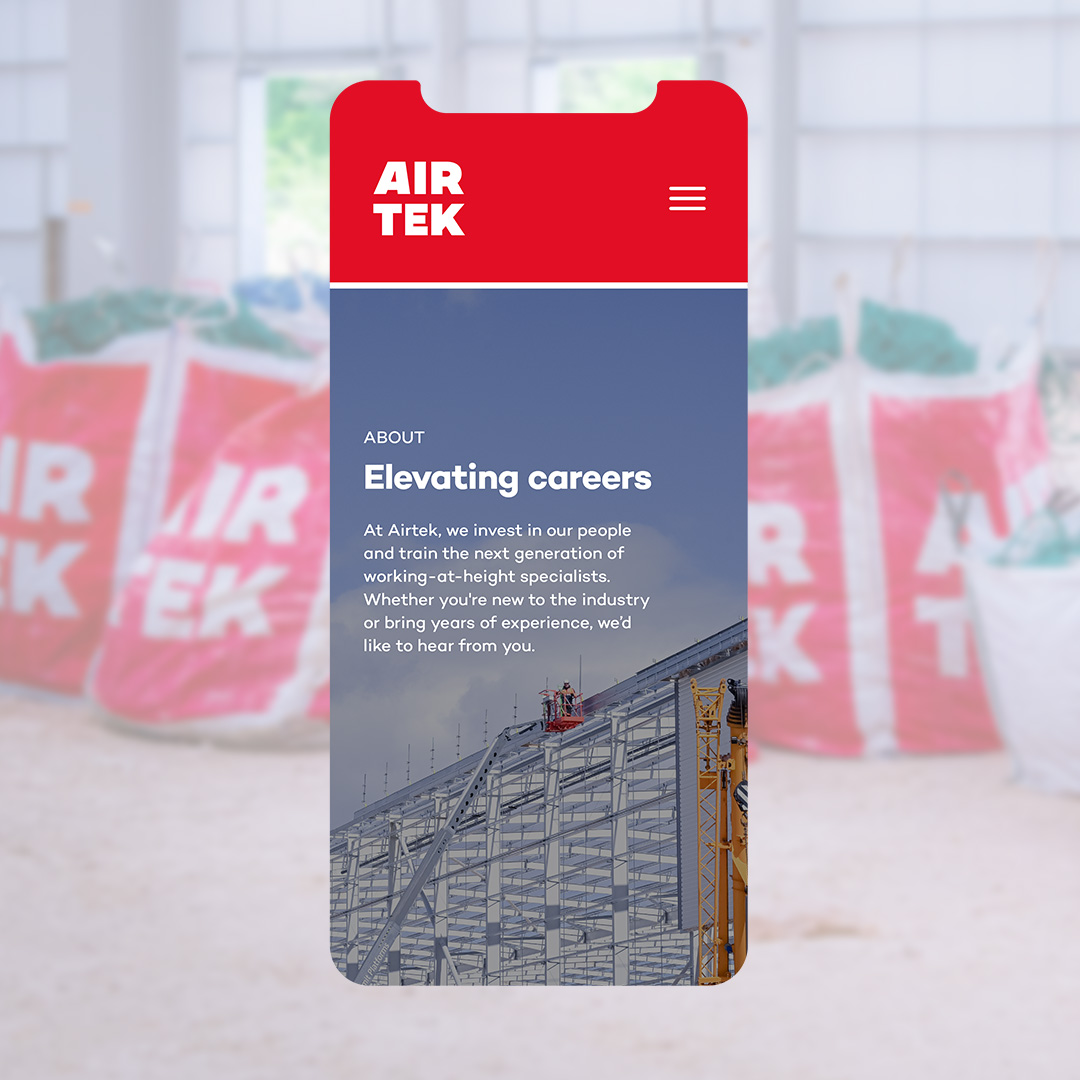 Mobile phone displaying the responsive layout of the Airtek website.