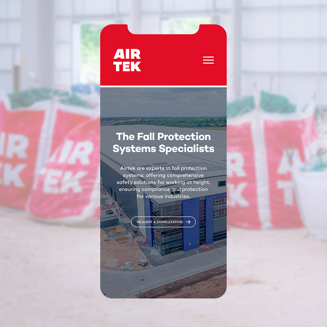 Mobile phone displaying the responsive layout of the Airtek website.