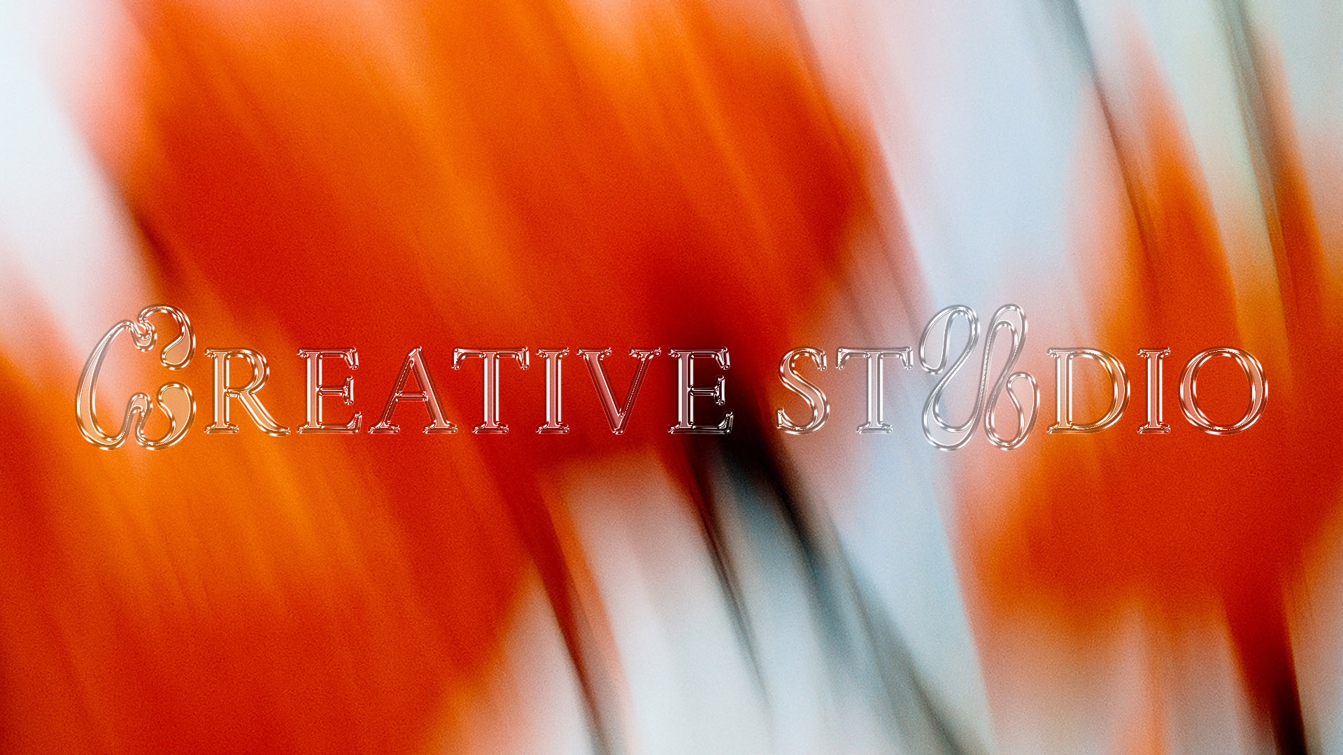 3D typography reading 'Creative Studio' over a blurred red, white, and black background.