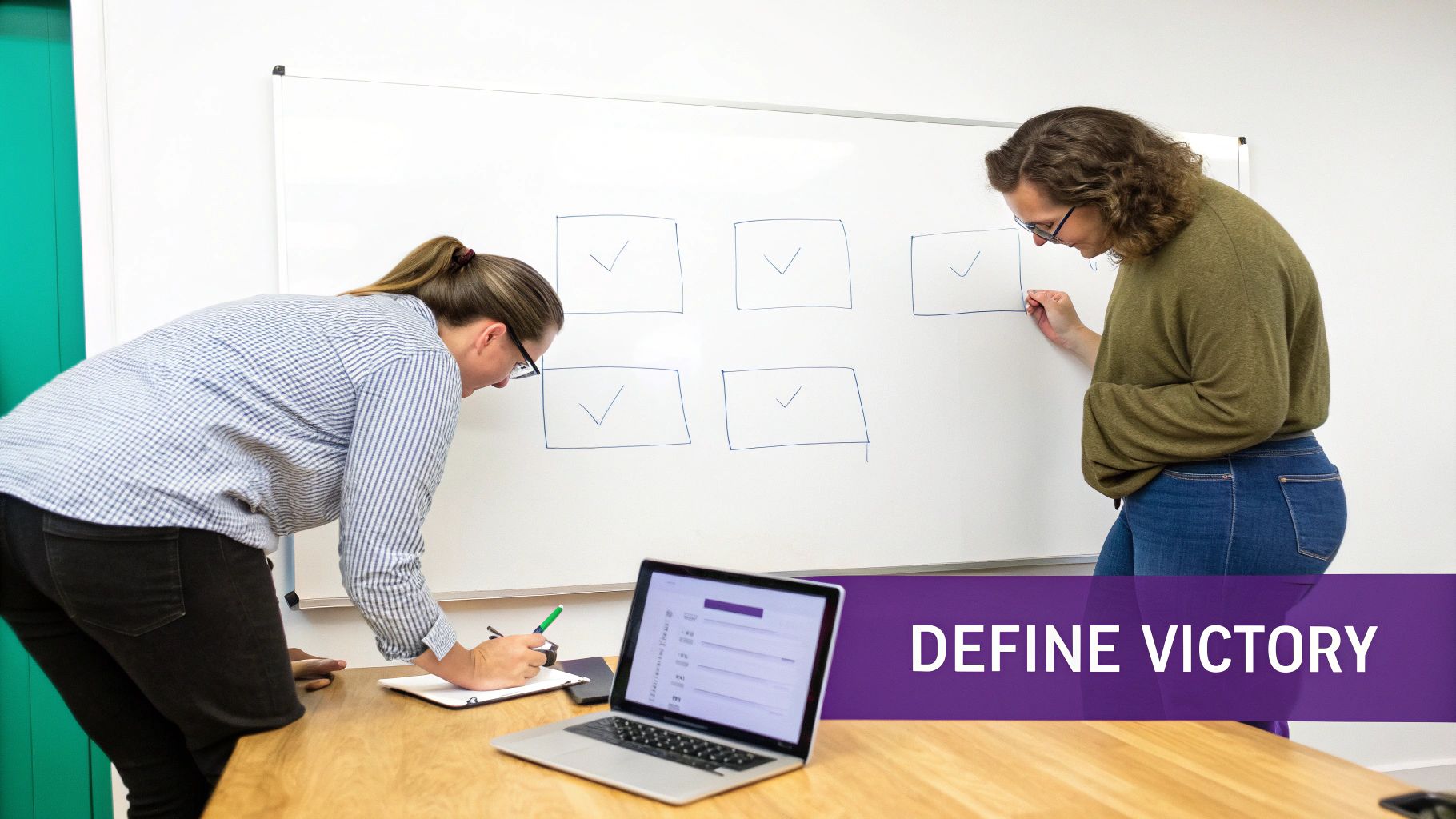 A person brainstorming website design and content ideas on a whiteboard.