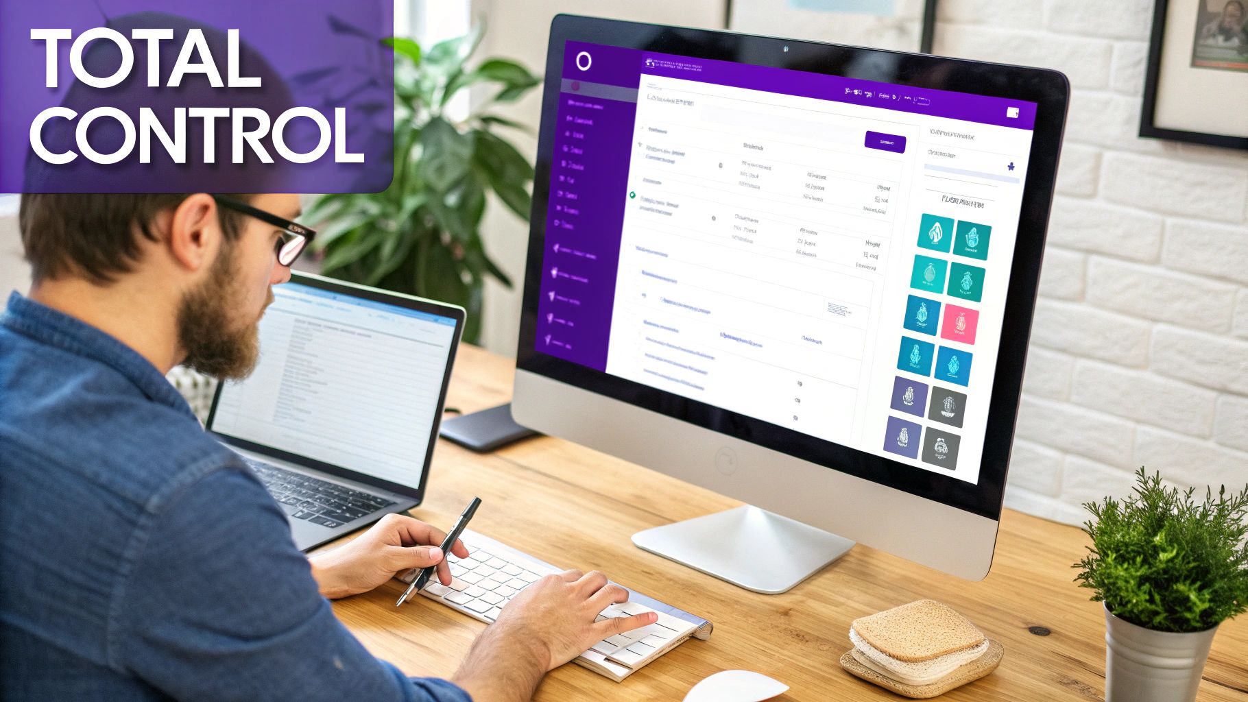 A person works at a modern desk with a desktop and laptop, managing an e-commerce platform dashboard.