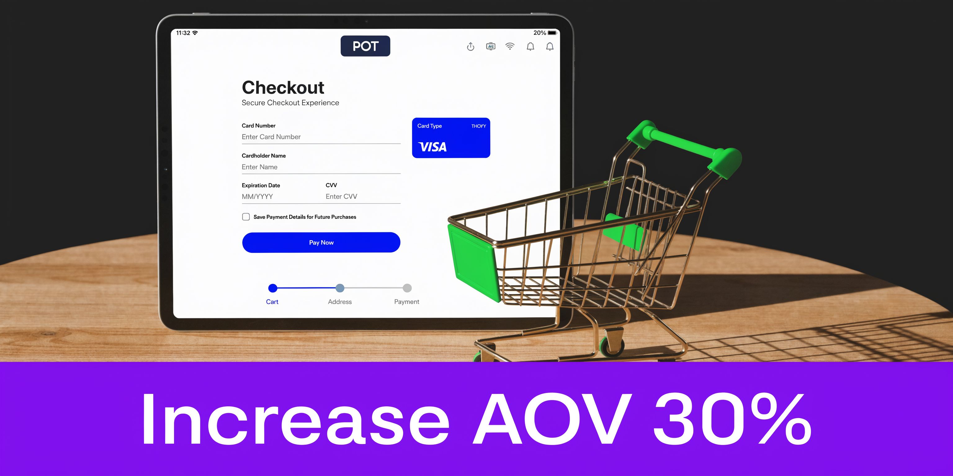 A digital tablet displaying a checkout screen on a wooden table next to a miniature shopping cart.