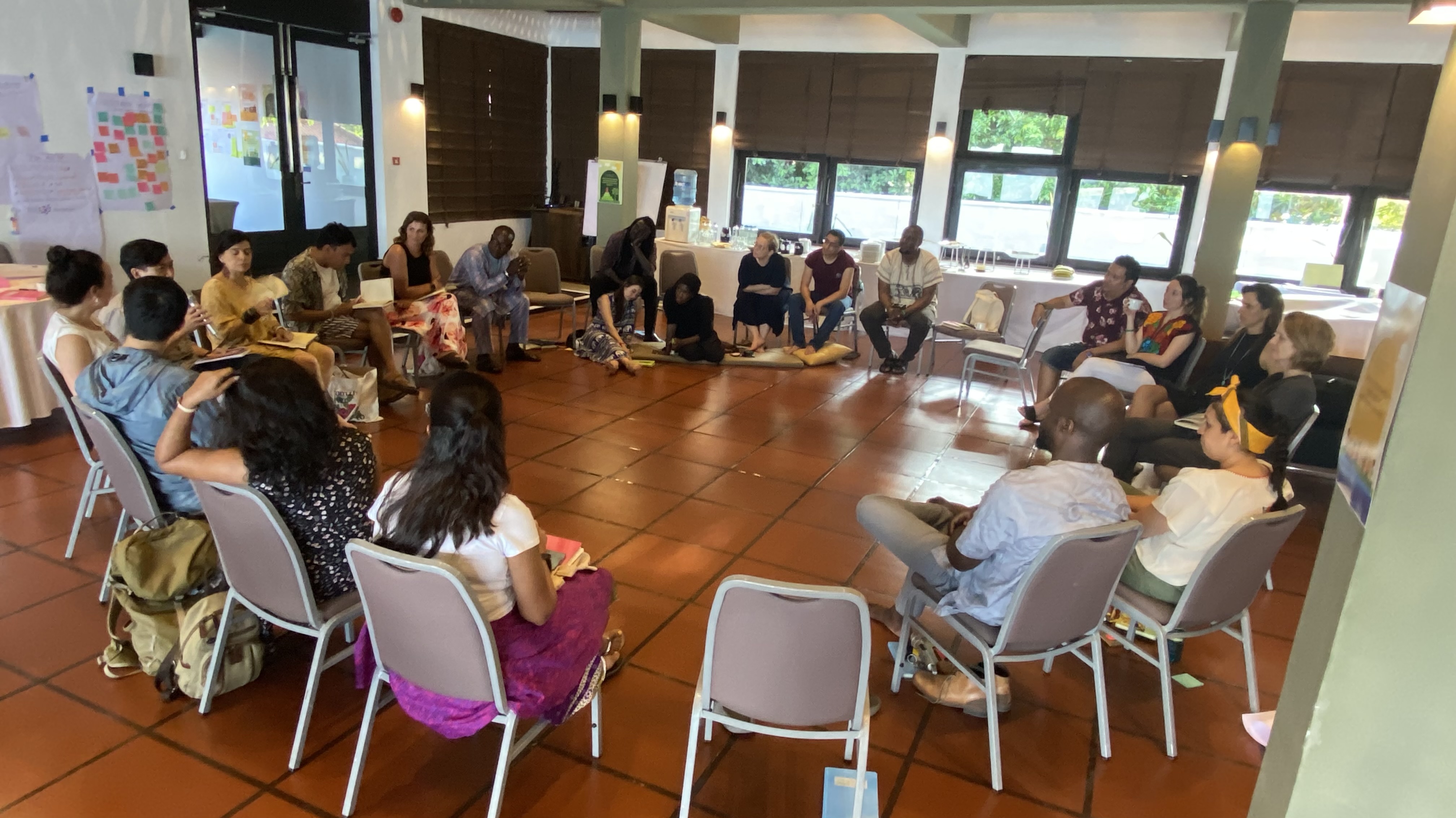 Members of the Reimagine Peacebuilding Community in a group discussion.