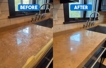 Side-by-side kitchen counters showing cloudy marble before and clean polished marble after restoration.