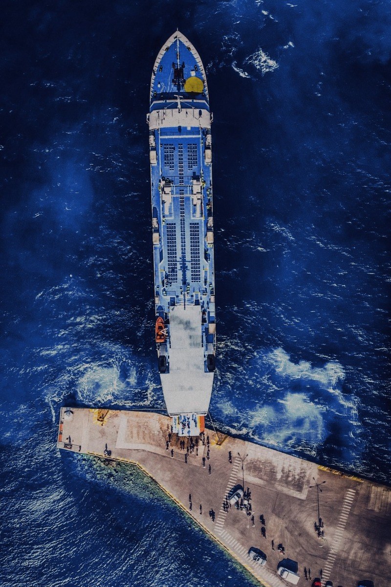 Aerial view of a passenger ferry docked at a pier