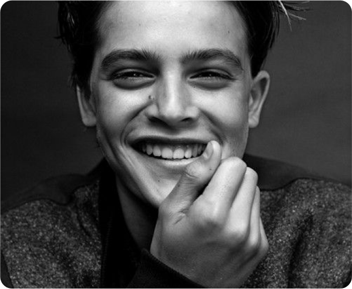 Photo of a young man smiling, representing a satisfied VCE student.