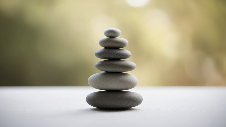 Balanced stacked stones representing portfolio balance across time horizons