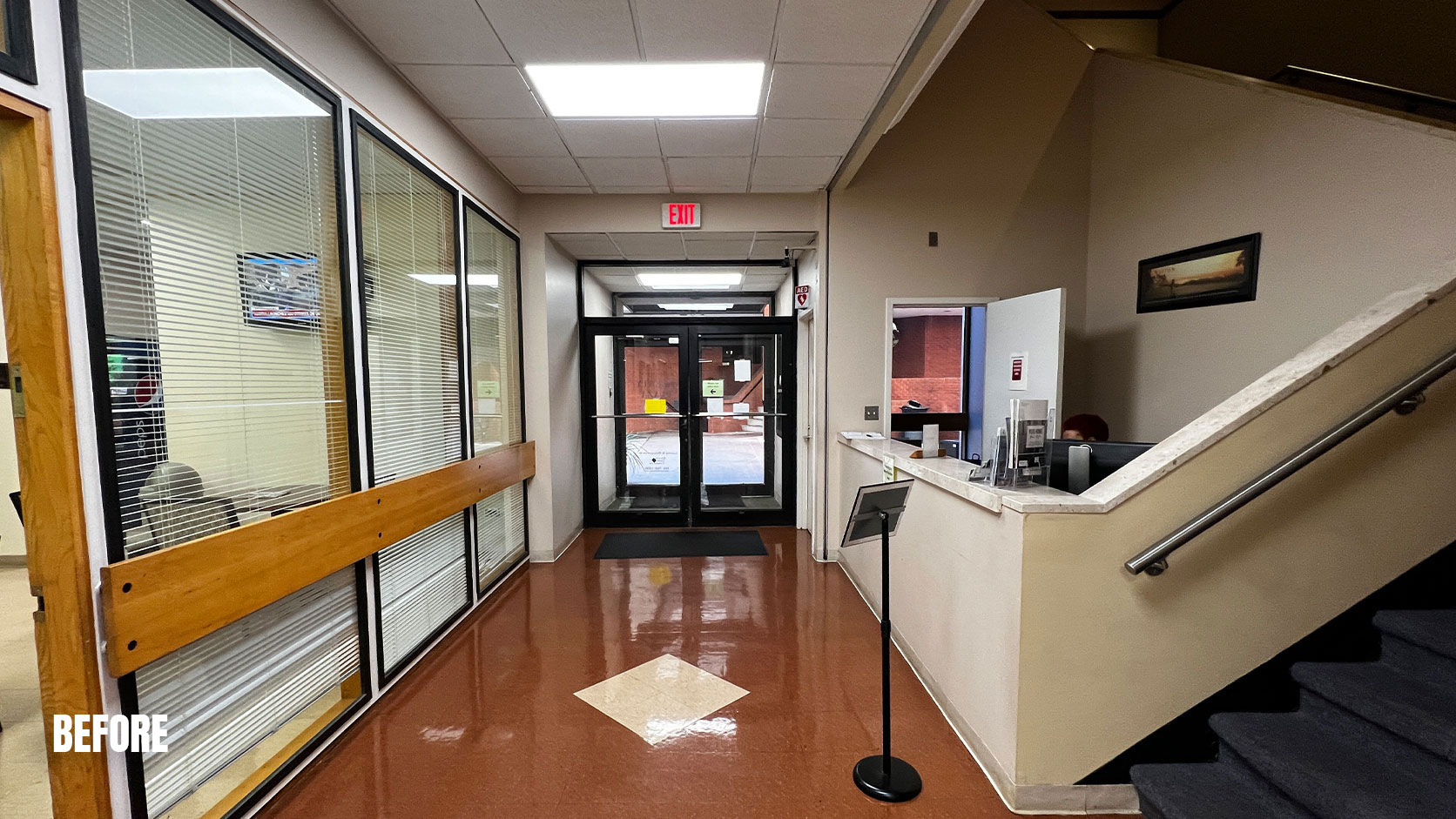 Existing commercial interior before renovation at Liberty Plaza in Winston Salem NC prior to building repositioning by Ossa Studio