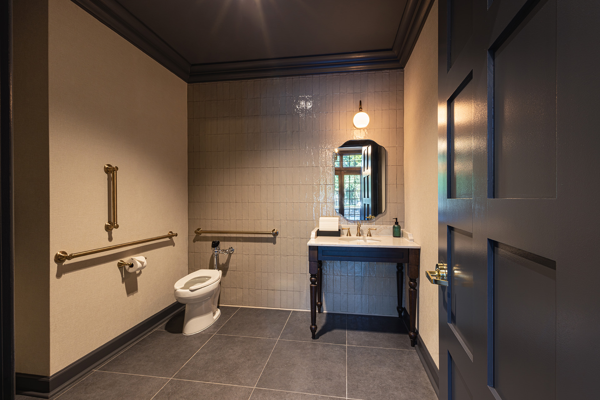 Accessible restroom renovation at Longview Country Club in Waxhaw, NC, designed by Ossa Studio.