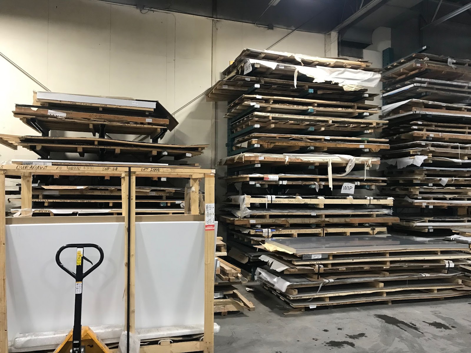 Wooden pallets stacked on the shop floor can lead to serious injury and extensive material damage. 