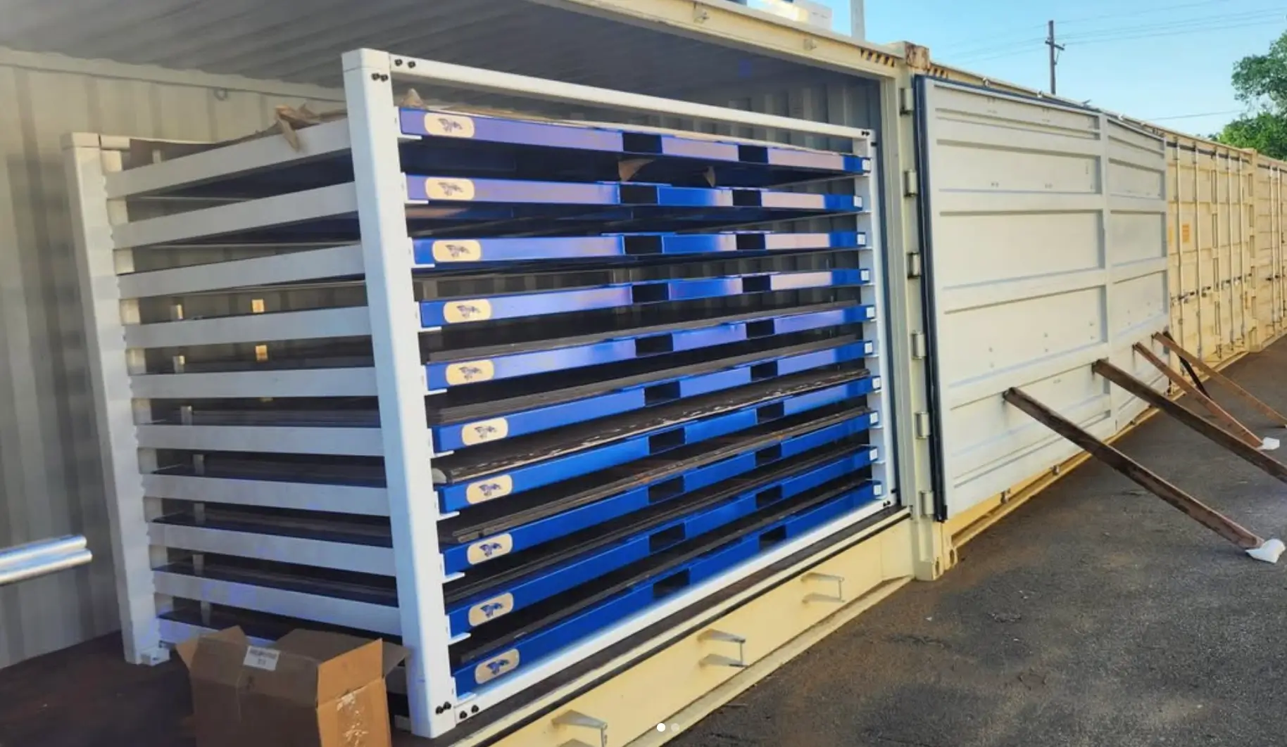 Sheet metal storage rack for organized production workflow