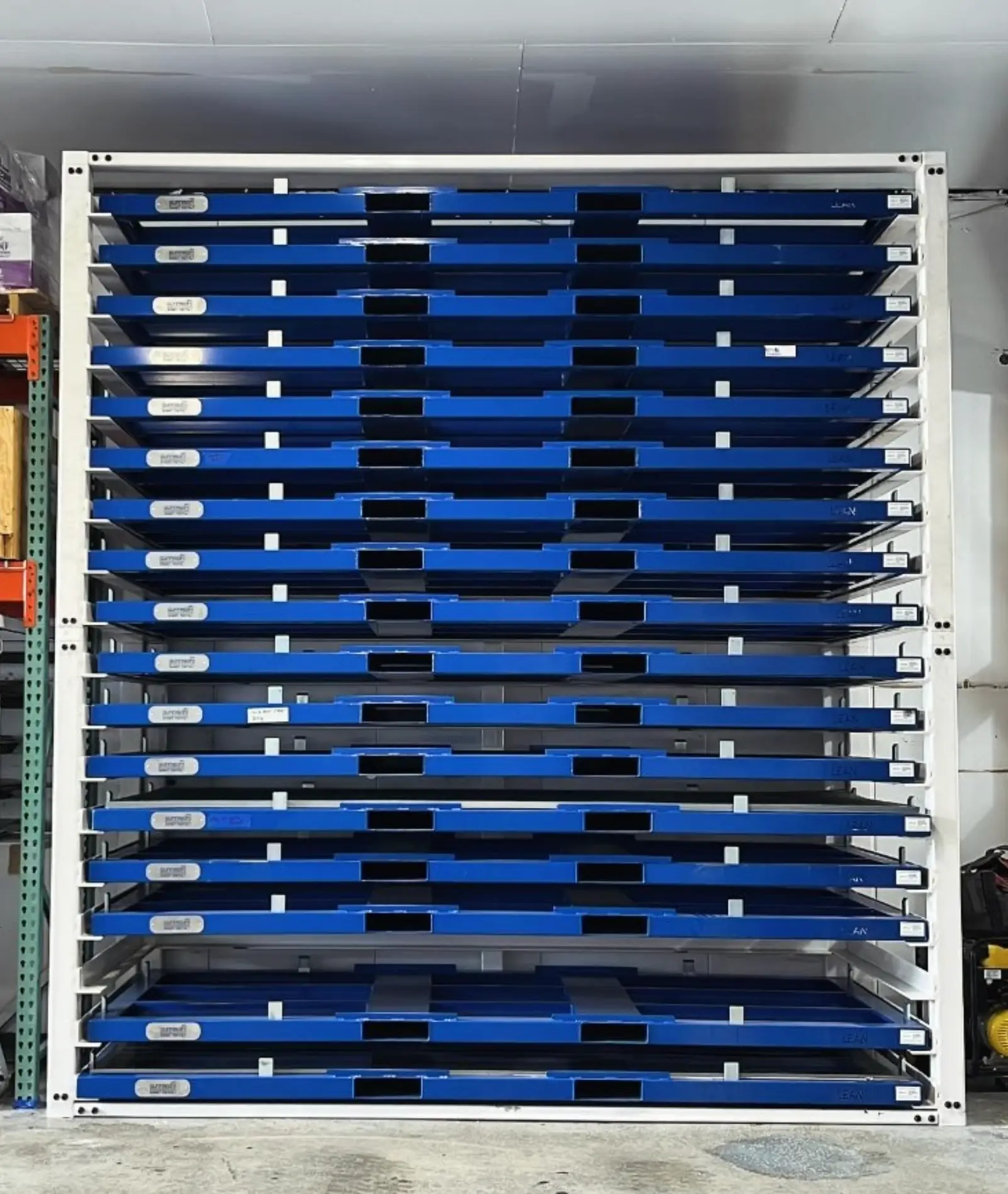 vertical sheet metal storage rack for streamlined operations