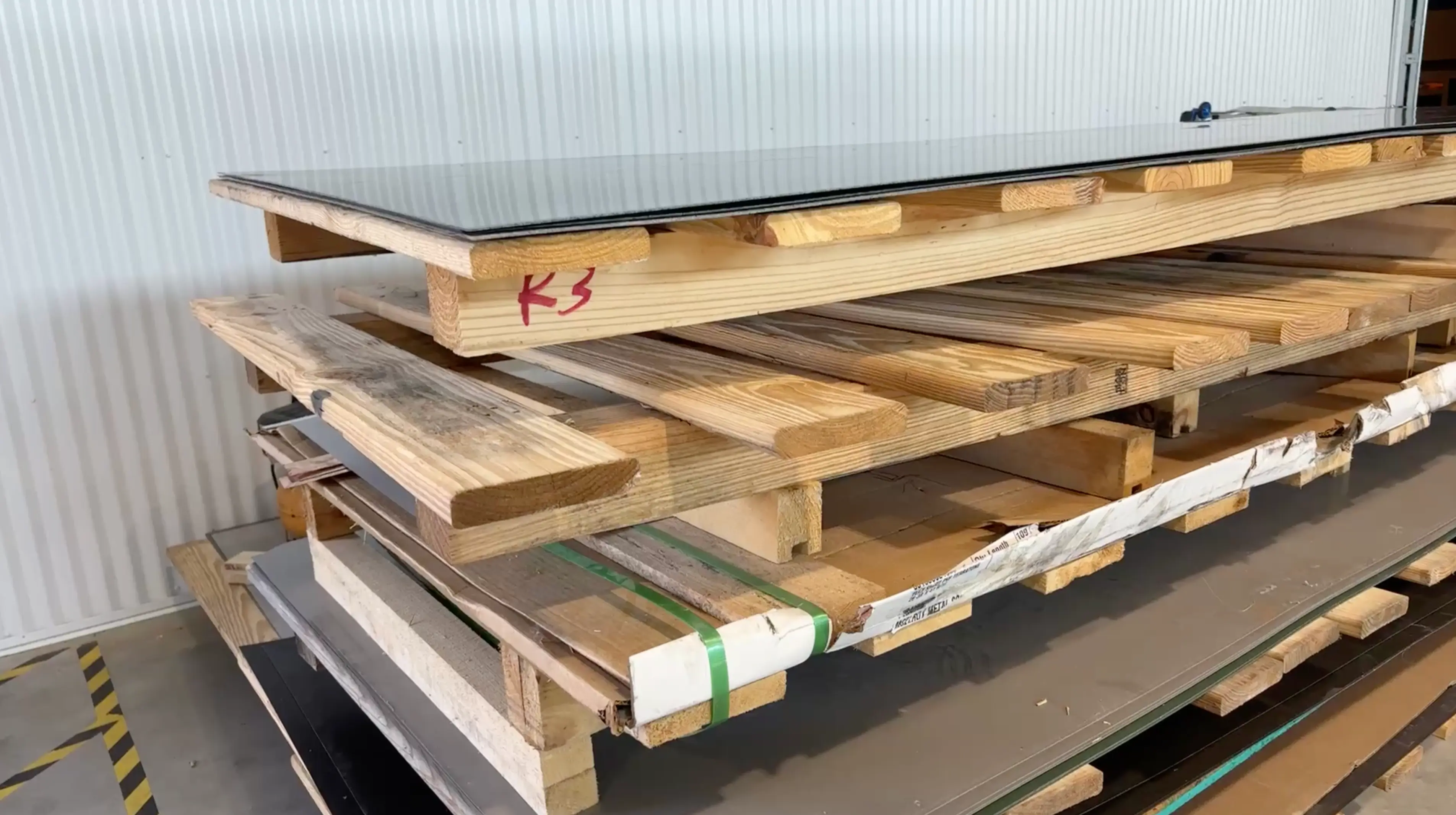 cluttered wooden pallets from traditional material storage